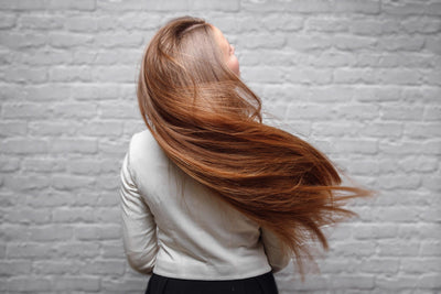 How to Put in Clip-in Hair Extensions at Home: A Stylist’s Step-By-Step